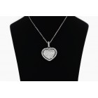 0.95 Cts Diamond Heart Pendant With Halo